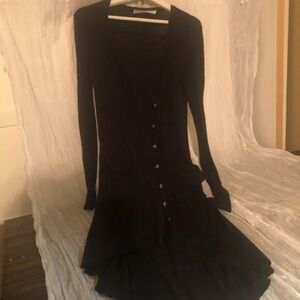 Free People Black long sleeve button down sweater with pockets size Small